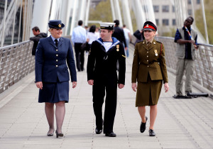 Tri-Service Personnel Saluting